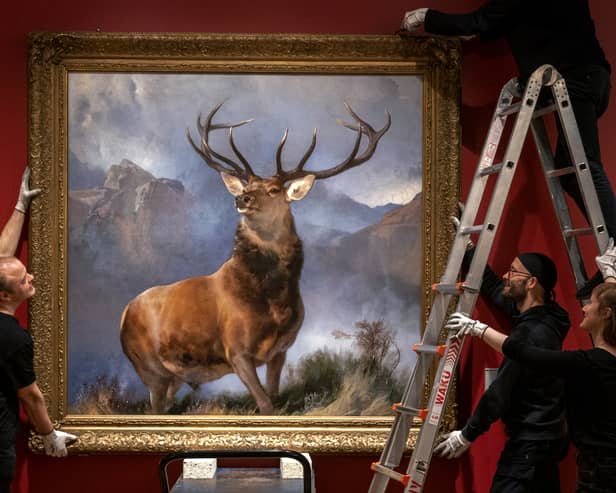 The Monarch of the Glen by Sir Edwin Landseer being installed at the new wing of the National Gallery of Scotland in Edinburgh