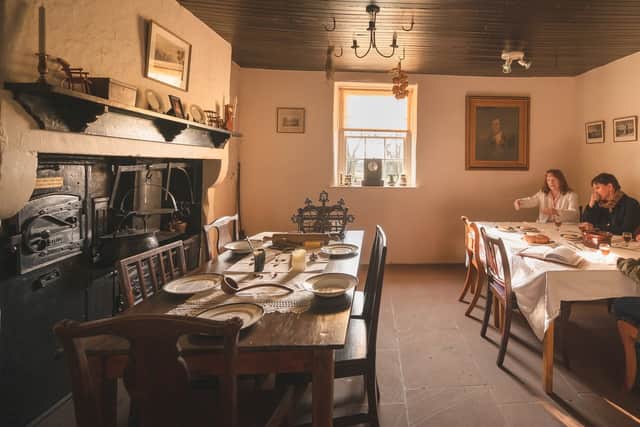Inside Ellisland and the kitchen where Burns and his family gathered