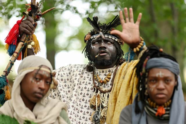 Kofi Offeh, centre, with Kaura Taylor, left, and Jean Gasho, right.