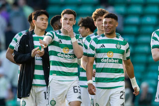 Celtic players take the acclaim of supporters after the win over Falkirk.