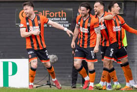 Dundee United full-back Will Ferry (centre) jokingly compared himself to Man City goal machine Erling Haaland after his brace in the derby at the weekend (Pic: SNS)
