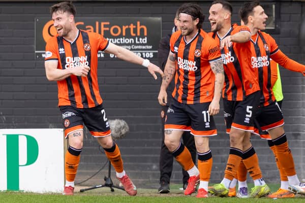 Dundee United full-back Will Ferry (centre) jokingly compared himself to Man City goal machine Erling Haaland after his brace in the derby at the weekend (Pic: SNS)