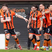Dundee United full-back Will Ferry (centre) jokingly compared himself to Man City goal machine Erling Haaland after his brace in the derby at the weekend (Pic: SNS)