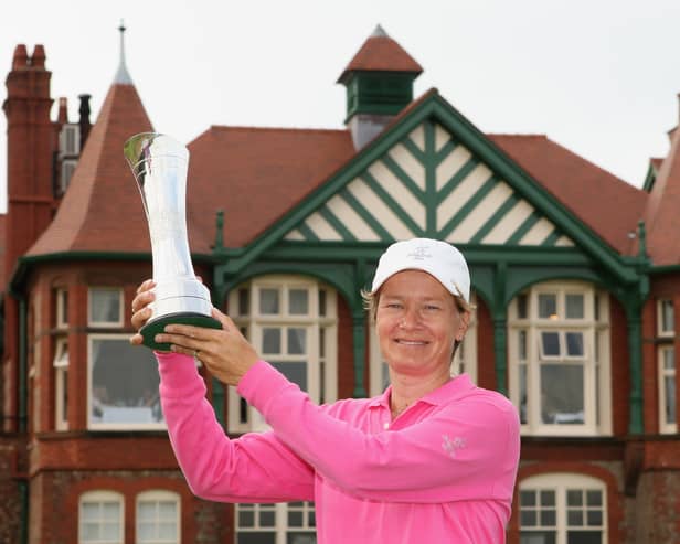 Catriona Matthew holds the trophy aloft after winning the 2009 Ricoh Women's British Open Championship at Royal Lytham St Annes Golf Club