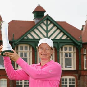 Catriona Matthew holds the trophy aloft after winning the 2009 Ricoh Women's British Open Championship at Royal Lytham St Annes Golf Club