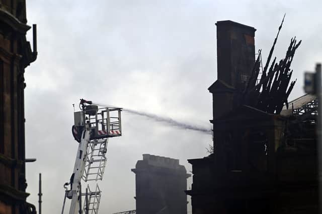 Firefighters spent days tackling the fire at the listed building. Picture: John Devlin