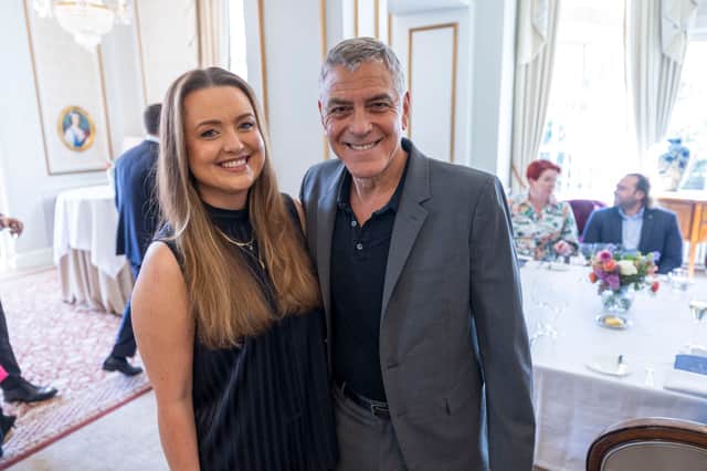 Claire Phale and George Clooney. Ms Phale won a competition to have lunch with the Hollywood legend.