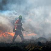 Firefighters bring a wildfire under control in Bonhill on Thursday
