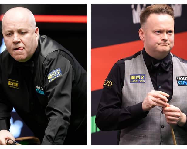 John Higgins, left, plays Shaun Murphy, right in the World Snooker Championship semi-final.