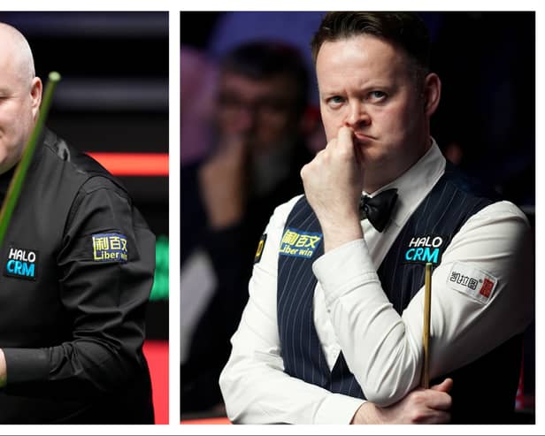 John Higgins, left, plays Shaun Murphy, right in the World Snooker Championship semi-final.