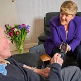 Clare Balding meets BT customer, John Garrard, age 77, to discuss the digital landline switch.