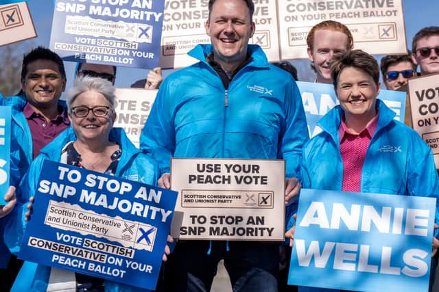 Scottish Conservative leader Russell Findlay with candidate Annie Wells and former leader Baroness Ruth Davidson,