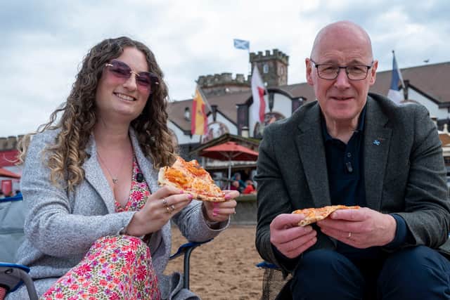 First Minister John Swinney and Political Correspondent Rachel Amery enjoy Civerino's pizza on Portobello Beach