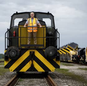 Rail Sidings Limited managing director Gary Draisey aboard shunting locomotive “Charlie” at the Eastriggs site