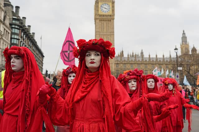 Extinction Rebellion climate change demonstrators take part in a rally in London in April 2023