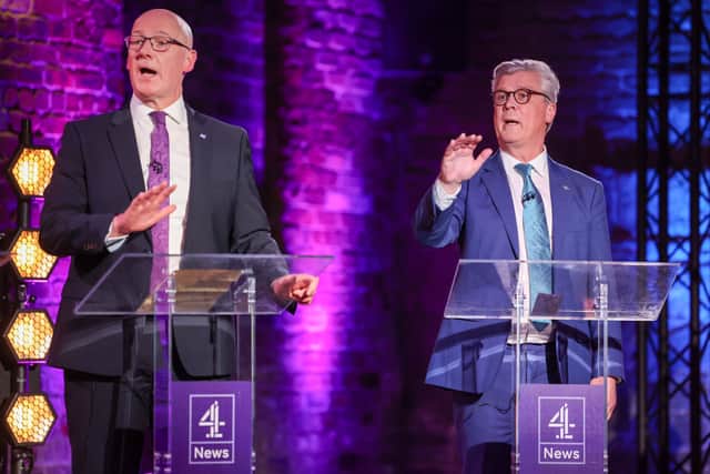 SNP leader John Swinney, clashing with Reform UK Scotland leader Malcolm Offord during the Channel 4 leaders debate