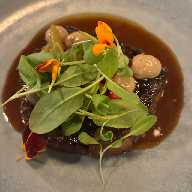 One of the dishes on the chef’s set menu at De Matroos en Het Meisje, a popular restaurant near the hotel.