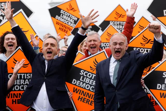 Liberal Democrat leader Ed Davey and Scottish party leader Alex Cole-Hamilton celebrate the Holyrood election results (Picture: Jeff J Mitchell)