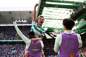 Daizen Maeda takes the acclaim of the Celtic fans during the win over Rangers.