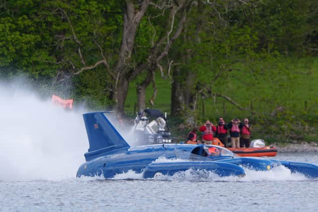 The restored Bluebird K7, which crashed killing Donald Campbell in 1967, takes to the water in Coniston. Picture: Owen Humphreys/PA Wire