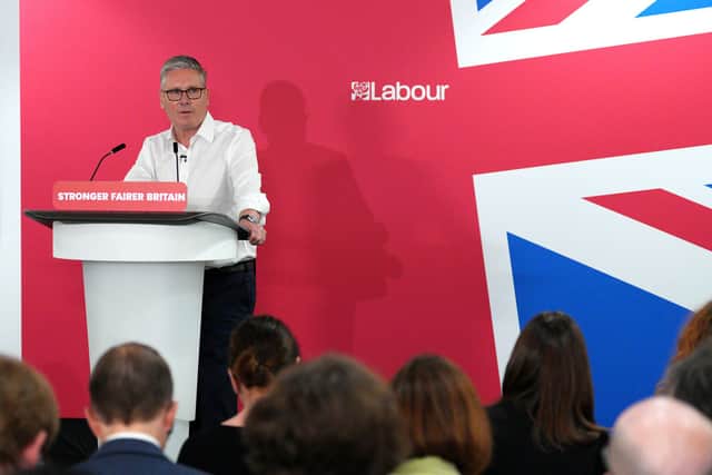 Keir Starmer literally rolled his sleeves up to give a speech defending his continued presence in 10 Downing Street (Picture: Carl Court)