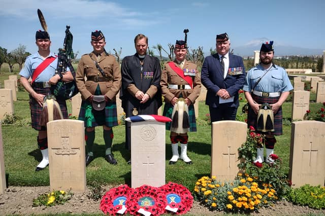 The military party at the graveside