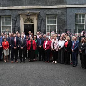 Scottish Labour MPs pose with Prime Minister Sir Keir Starmer, Scottish leader Anas Sarwar and deputy leader Dame Jackie Baillie outside 10 Downing Street.