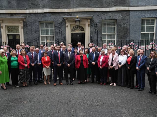Scottish Labour MPs pose with Prime Minister Sir Keir Starmer, Scottish leader Anas Sarwar and deputy leader Dame Jackie Baillie outside 10 Downing Street.