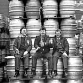 Fountain Brewery workers Harry Traunter, John Smith and Tom Owens celebrate in March 1989 after a planned merger by the Australian company Elders IXL with Scottish & Newcastle Breweries fails