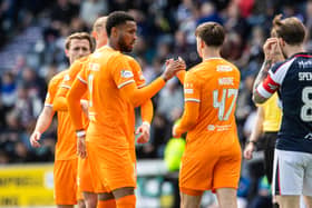Rangers' Youssef Chermiti (L) celebrates with Mikey Moore (R) after scoring to make it 2-0 against Falkirk