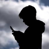Children are being groomed online, manipulated into sharing images and then blackmailed by criminal gangs on an industrial scale (Picture: David Gray)