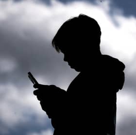 Children are being groomed online, manipulated into sharing images and then blackmailed by criminal gangs on an industrial scale (Picture: David Gray)