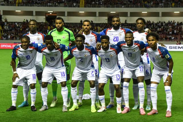 Haiti's players pose for a team photo ahead of the 2026 FIFA World Cup Concacaf qualifier against Costa Rica