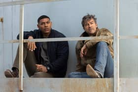 Aaron Pierre as John Stewart and Kyle Chandler as Hal Jordan in Lanterns. 