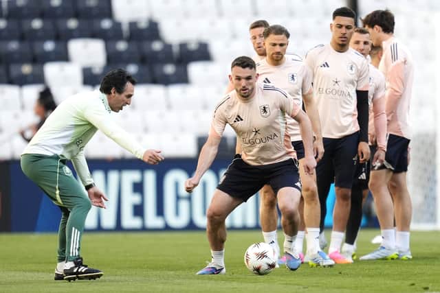 Aston Villa manager Unai Emery (left) in discussion with John McGinn during a training session at Besiktas Park, Istanbul ahead of the Europa League final.
