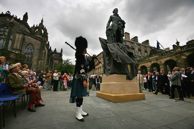 The statue of Scottish economist, philosopher and author Adam Smith (1723-1790) on Edinburgh's Royal Mile, pictured at its unveiling on July 4, 2008 (Picture: Jeff J Mitchell)