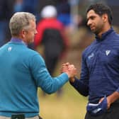  Luke Donald and Aaron Rai shake hands during the 2023 Genesis Scottish Open at The Renaissance Club 