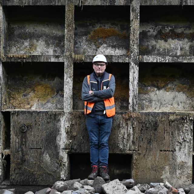 Chris O'Connell, Scottish Canals' heritage manager, beside a lock gate near the east end of the Kelvin Aqueduct