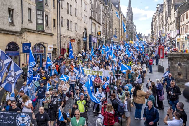 Supporters of Scottish independence take part in a rally on Edinburgh's Royal Mile in 2023