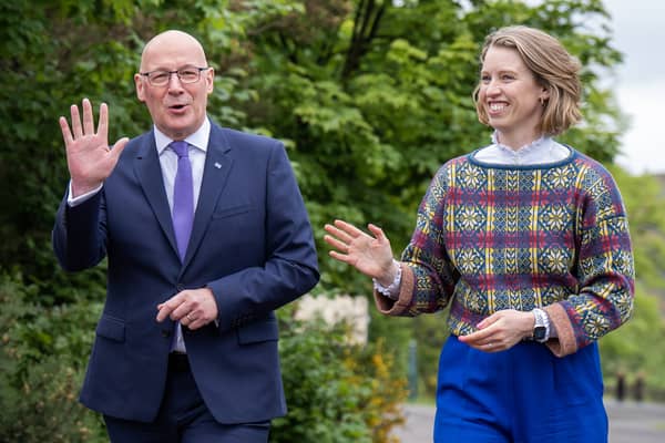 First Minister John Swinney and Public Finance Minister Hannah Mary Goodlad