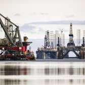 Disused North Sea oil rigs stacked up in the Cromarty Firth during a downturn in the sector in 2018