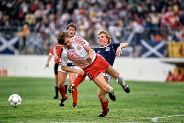Ivan Nielsen of Denmark is challenged by Frank McAvennie of Scotland during the 1986 World Cup.