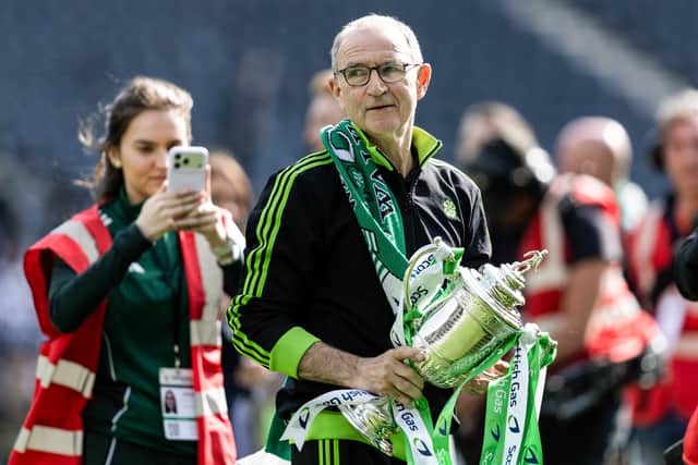 Celtic manager Martin O'Neill with the Scottish Cup trophy after the 3-1 win over Dunfermline at Hampden. (Photo by Ross Parker / SNS Group)