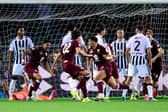 Che Adams celebrates scoring a late equaliser for Torino against Juventus at the Olympic Grande Torino Stadium. (Photo by MARCO BERTORELLO / AFP via Getty Images)