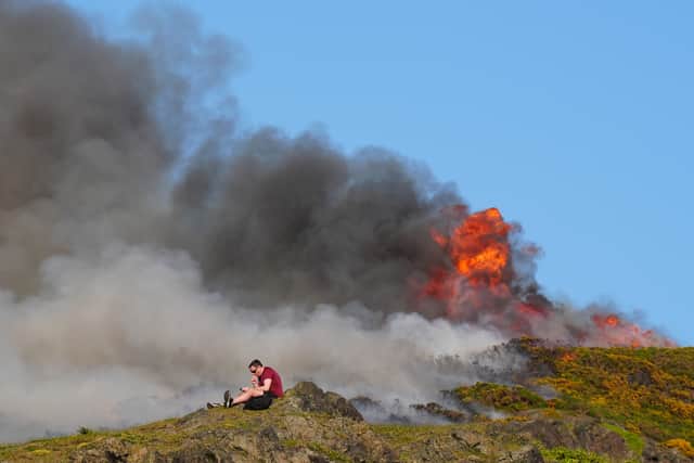 A view of the fire close to the ruins of St Anthony's Chapel in Holyrood Park