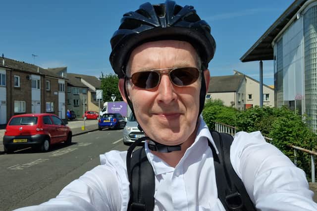 The Scotsman Transport Correspondent Alastair Dalton riding to its Edinburgh office on Tuesday
