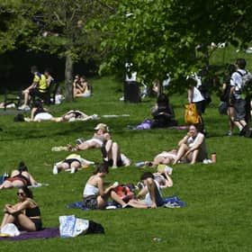Sunbathers in Kelvingrove Park, Glasgow, on Tuesday