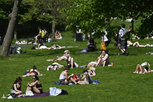 Sunbathers in Kelvingrove Park, Glasgow, on Tuesday
