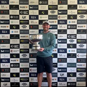 Mitchell Cowie shows off the trophy after winning the Southerness Classic presented by presented by Alistair Brown International