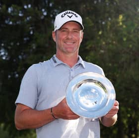 Marc Warren shows off his salver for making 500 appearances on the DP World Tour